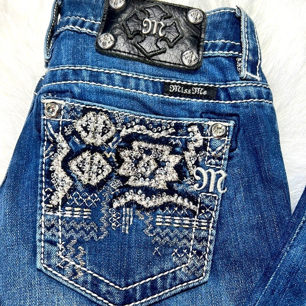 Miss Me jeans size 26 with glittering beads in the back of the jeans